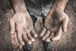 Man with dirty hands