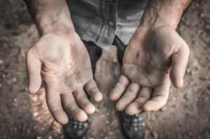 Man with dirty hands